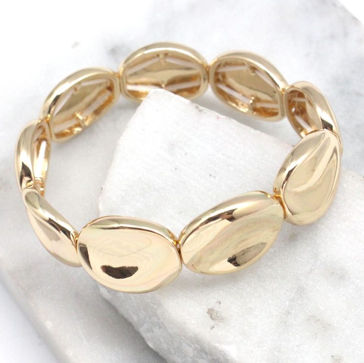 A photo of the Turn it Up Bracelet in Gold product