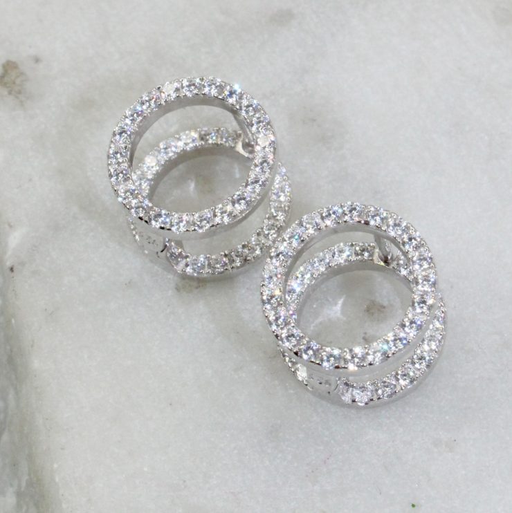 A photo of the Barrel Hoop Earrings product