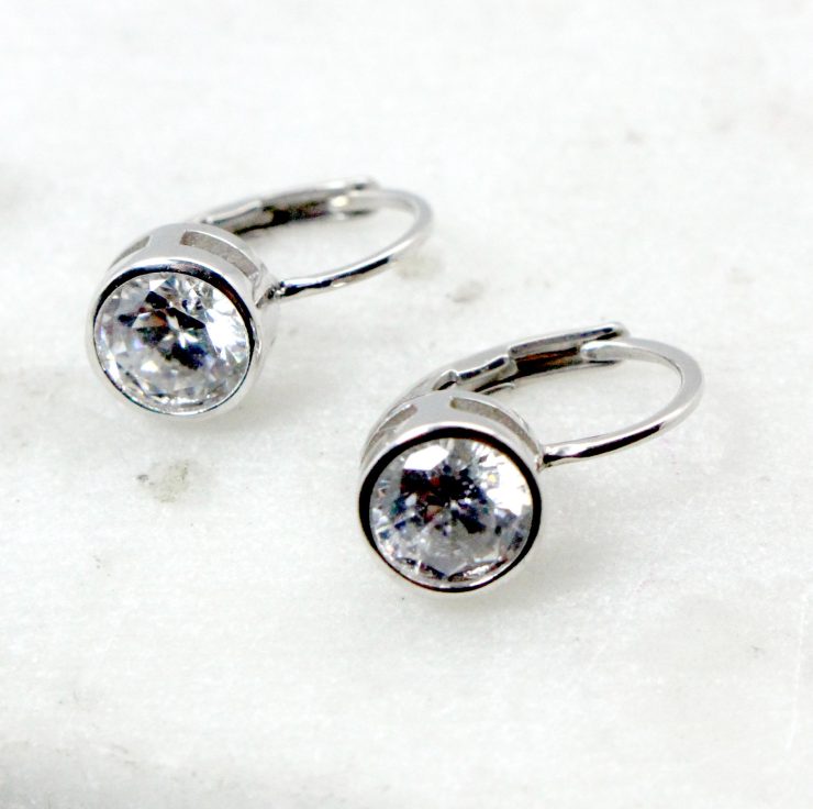 A photo of the Circular Rhinestone Dangle Earrings product