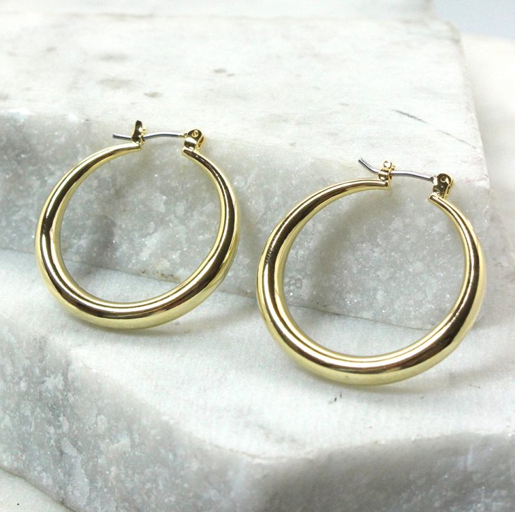 A photo of the Claudette Hoop Earrings product