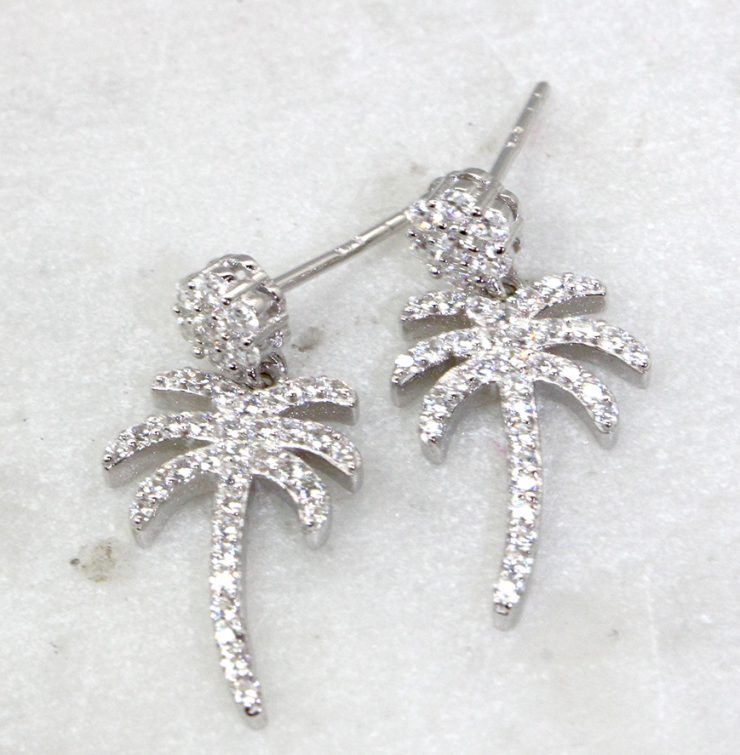 A photo of the Palm Post Earrings product