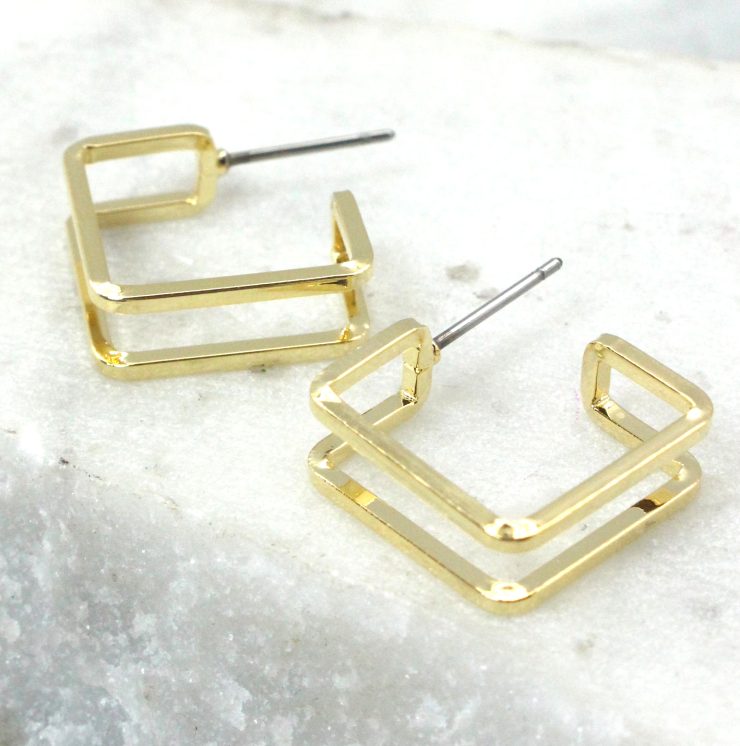 A photo of the Square Hooplette Earrings product