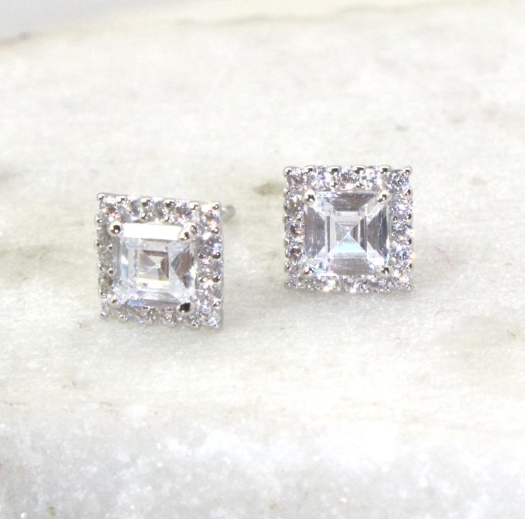 A photo of the Square Stud Earrings product