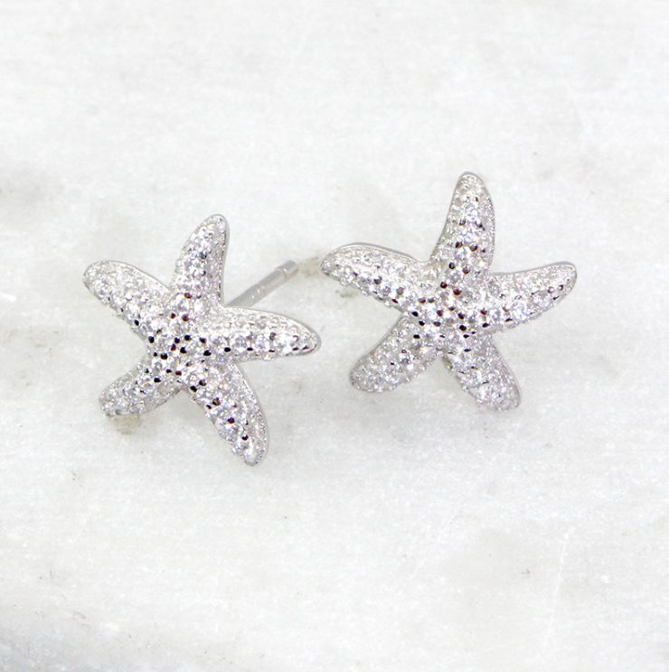 A photo of the Starfish Stud Earrings product