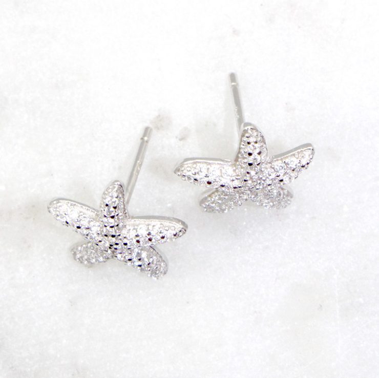 A photo of the Starfish Stud Earrings product