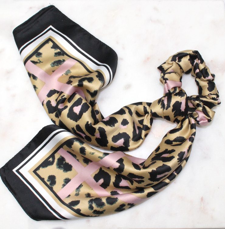 A photo of the Leopard Scrunchie Hair Scarf product
