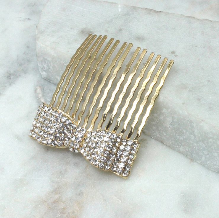 A photo of the Rhinestone Bow Hair Comb product