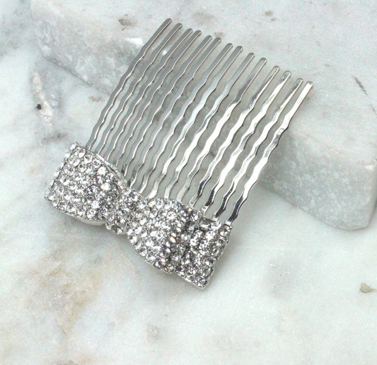 A photo of the Rhinestone Bow Hair Comb product