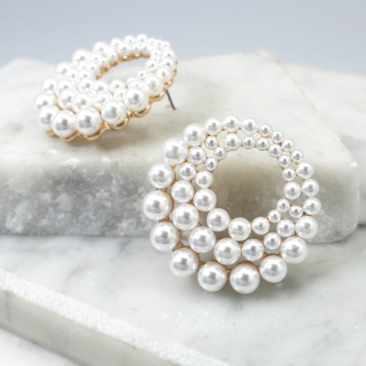 A photo of the Brianna Pearl Earrings product