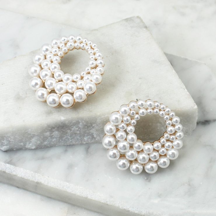 A photo of the Brianna Pearl Earrings product