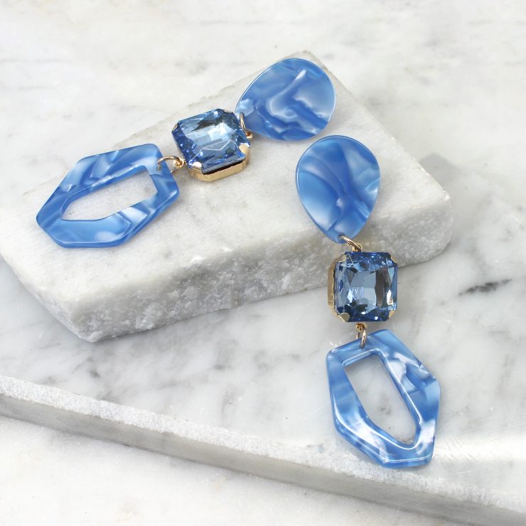 A photo of the Luna Earrings In Blue product