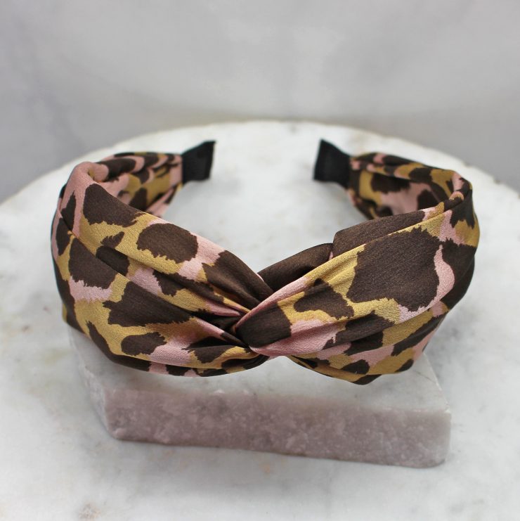 A photo of the Blush & Brown Leopard Headband product