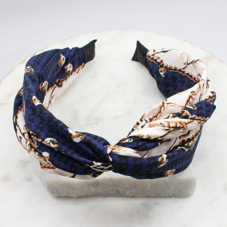 A photo of the Navy & White Houndstooth Headband product