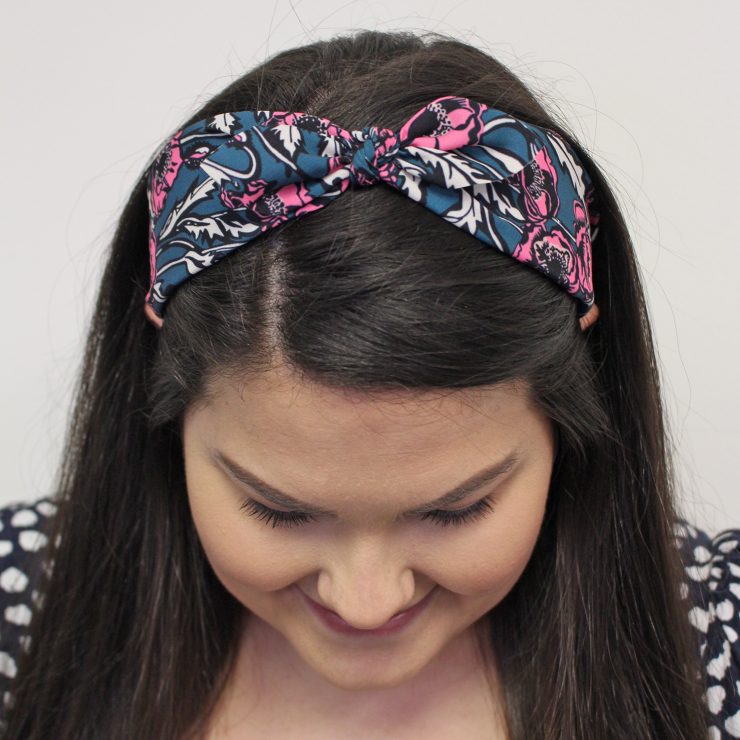 A photo of the Pink Poppy Flower Headband product