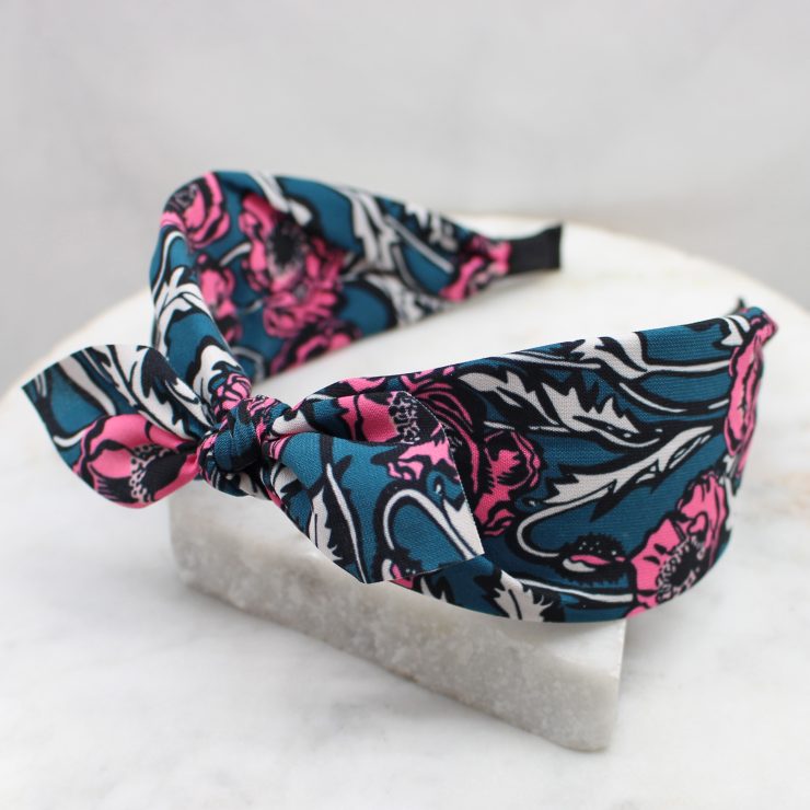 A photo of the Pink Poppy Flower Headband product