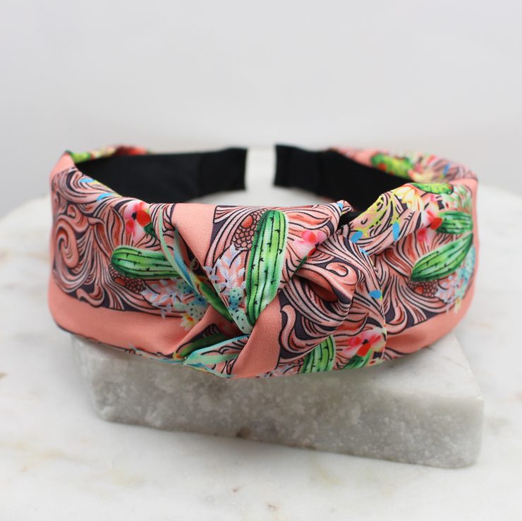 A photo of the Colorful Cactus Headband product