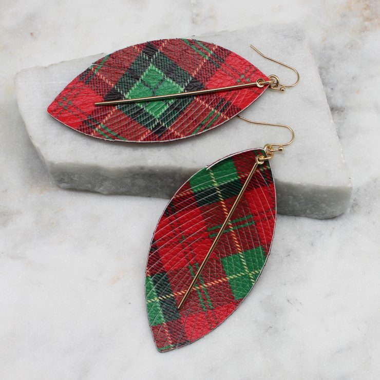 A photo of the Holiday Tartan Feather Earrings product