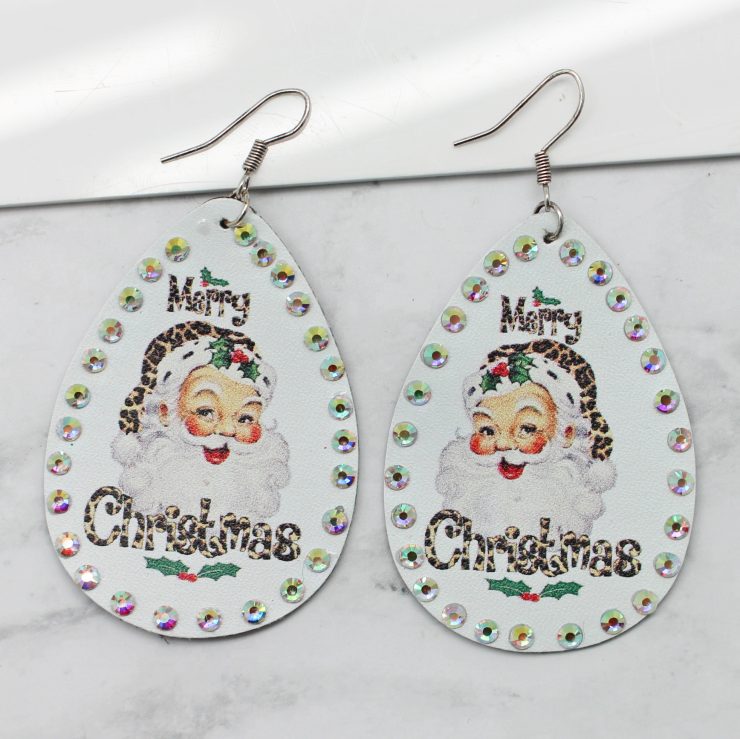 A photo of the Leopard Santa Earrings product