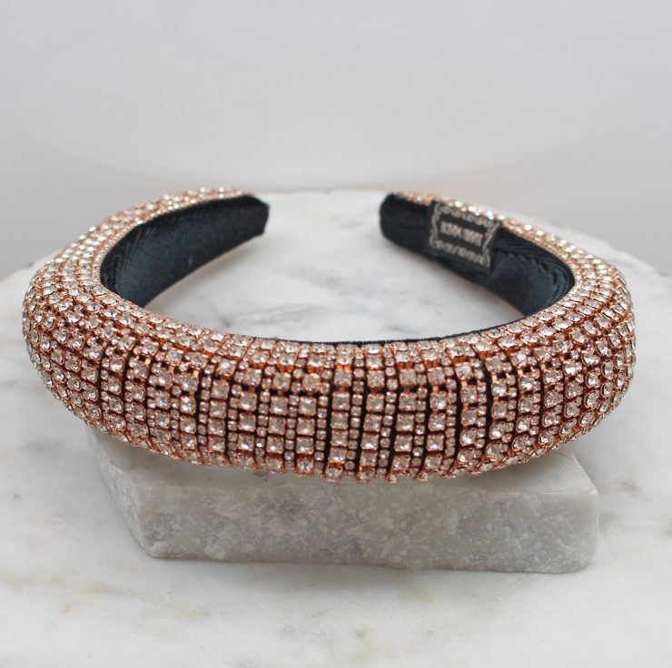 A photo of the Rhinestone Headband In Rose Gold product