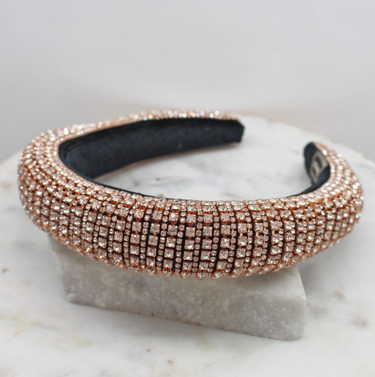 A photo of the Rhinestone Headband In Rose Gold product