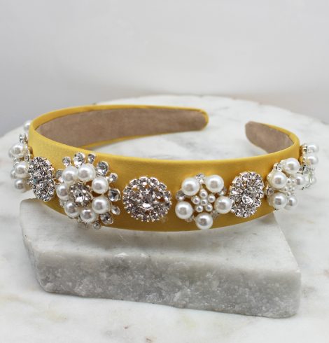 A photo of the Elegant Pearl Headband In Yellow product