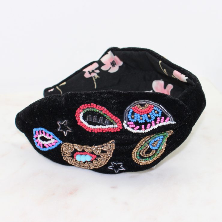 A photo of the Black Paisley Beaded Headband product