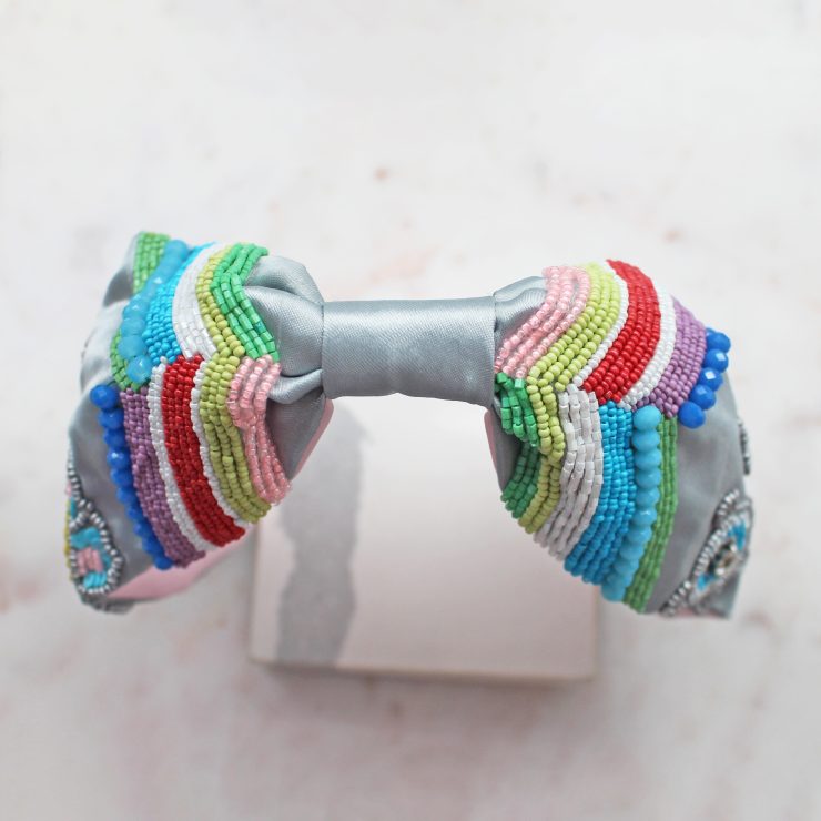 A photo of the Grey Floral Beaded Headband product