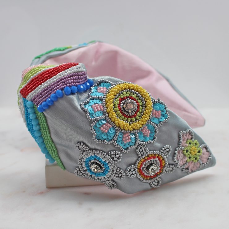 A photo of the Grey Floral Beaded Headband product