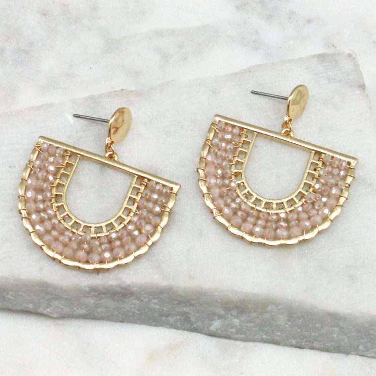 A photo of the Jasmine Earrings In Light Pink product