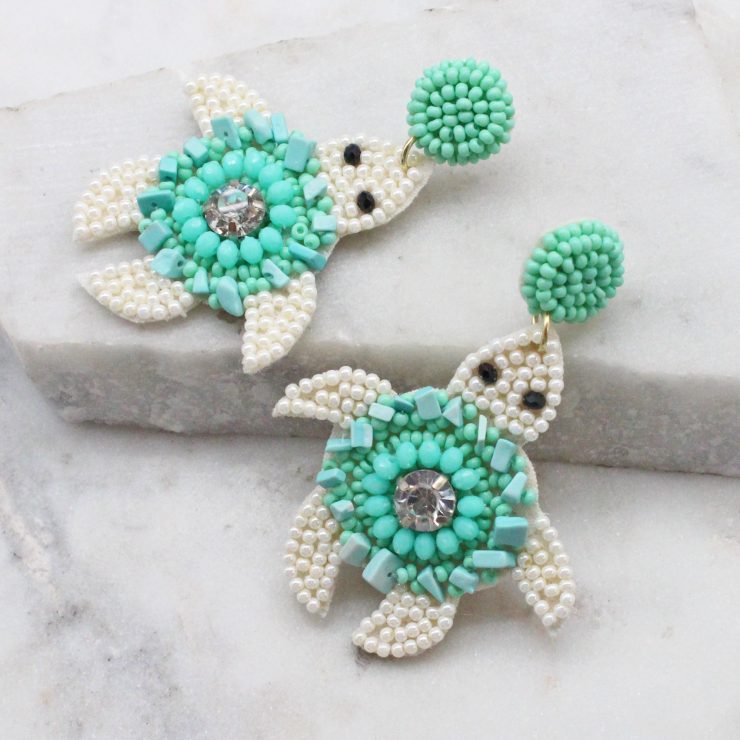 A photo of the Sea Turtle Beaded Earrings product