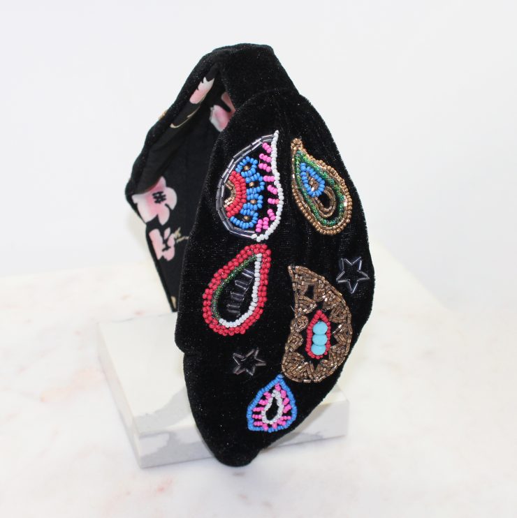 A photo of the Black Paisley Beaded Headband product