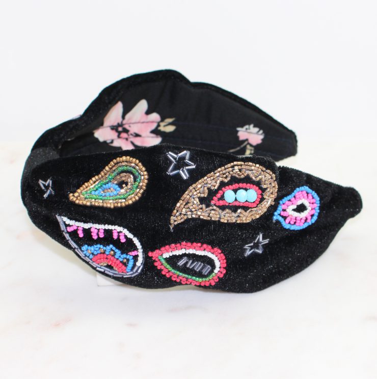 A photo of the Black Paisley Beaded Headband product