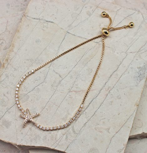 A photo of the Dazzling Starfish Adjustable Bracelet In Gold product