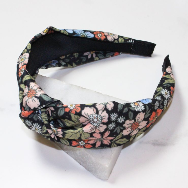 A photo of the Flower Bomb Headband In Black product