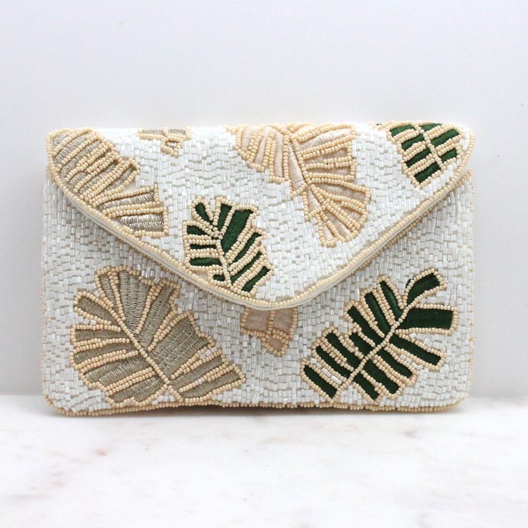 A photo of the Mini Tropical Beaded Clutch in White product