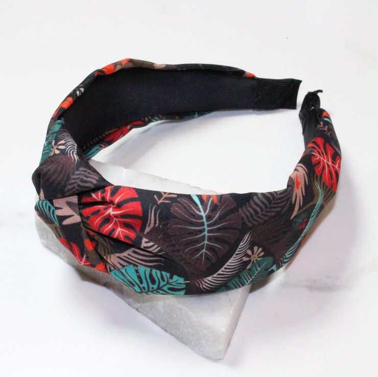 A photo of the Tropical Leaf Headband In Black product