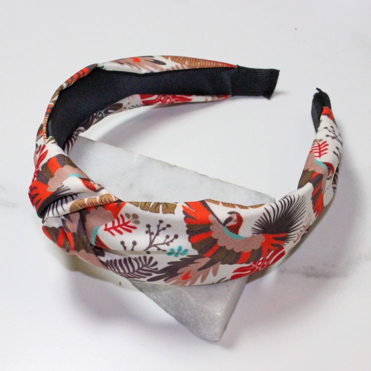 A photo of the Tropical Leaf Headband In White product