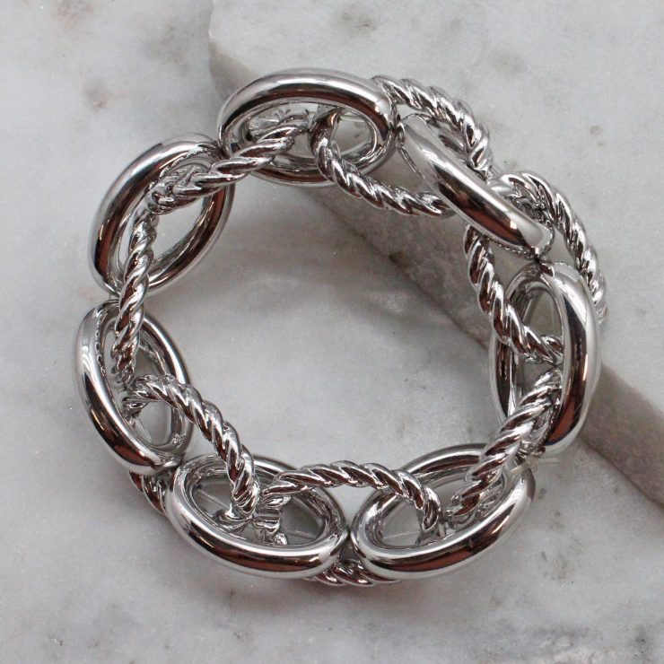 A photo of the Twisted Links Bracelet In Silver product