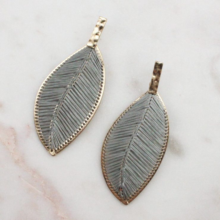A photo of the Everleigh Earrings In Grey product