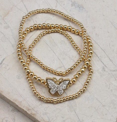A photo of the Butterfly Beaded Stack Bracelet Set product