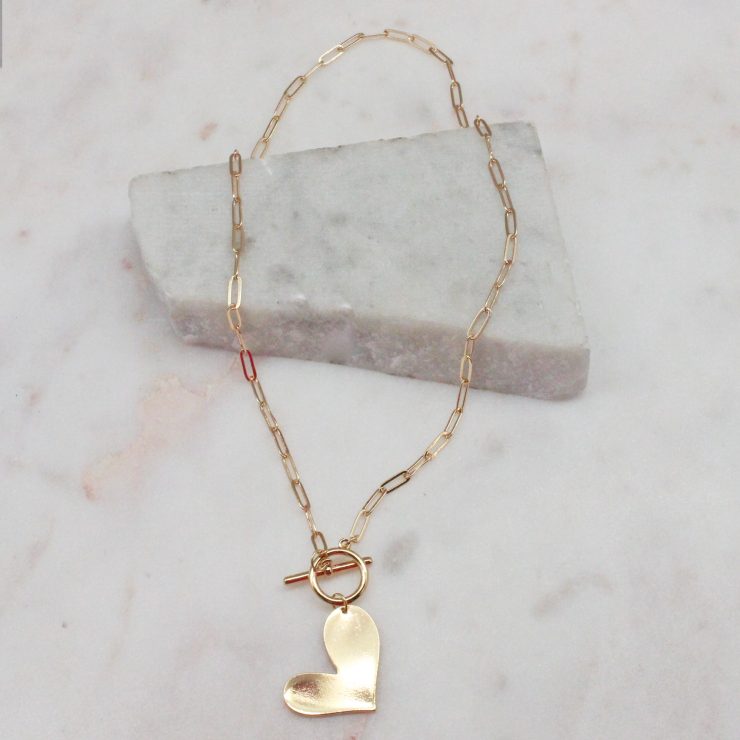 A photo of the Heart Paper Clip Necklace In Gold product