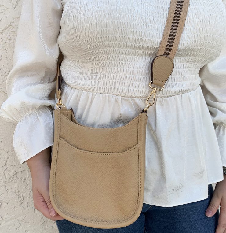 A photo of the Mini Messenger Bag In Light Beige product