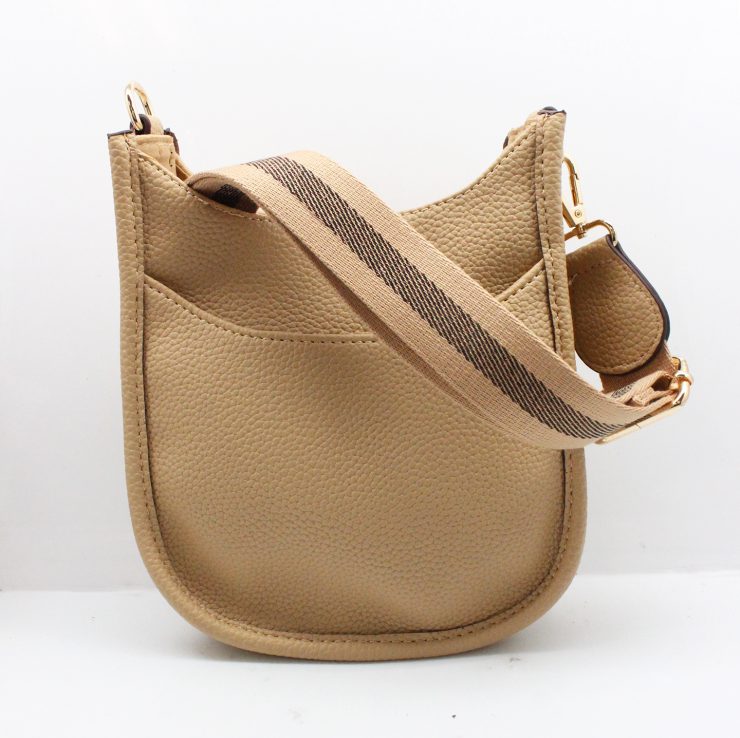 A photo of the Mini Messenger Bag In Light Beige product