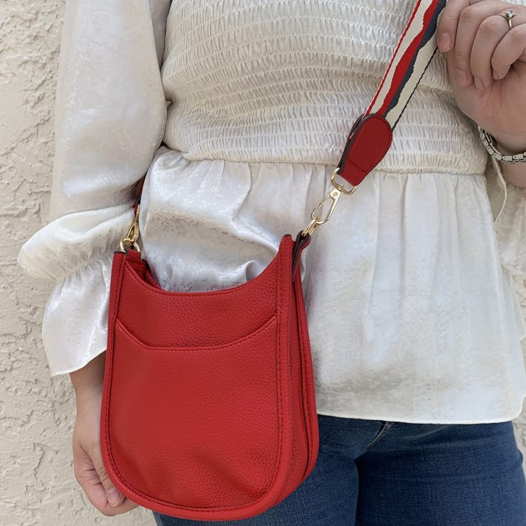 A photo of the Mini Messenger Bag In Red product