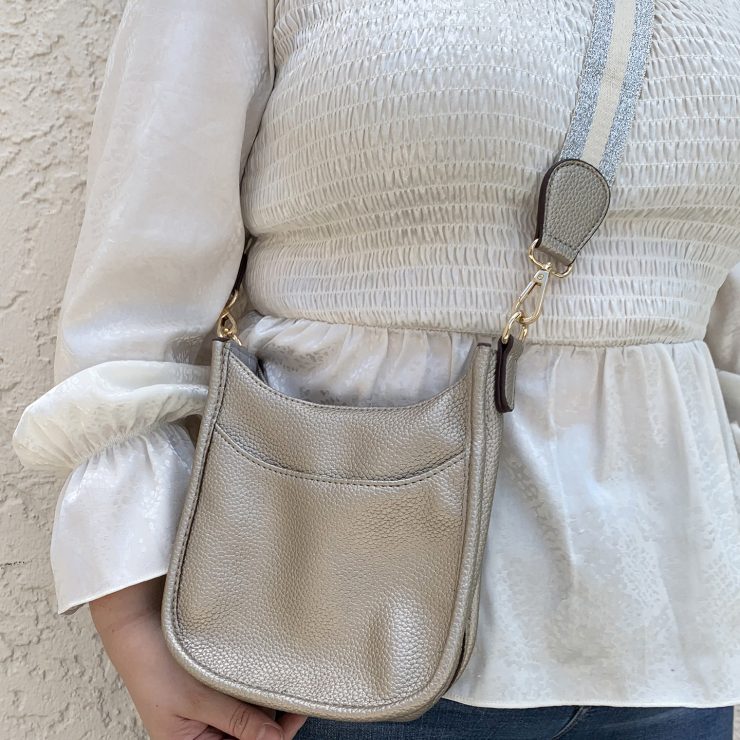 A photo of the Mini Messenger Bag In Silver product