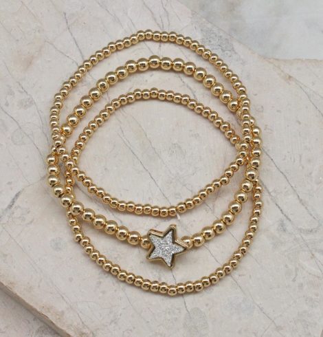 A photo of the Star Beaded Stack Bracelet Set product