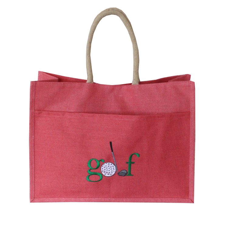 A photo of the Jute Golf Tote In Coral product