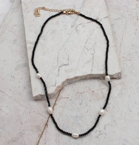 A photo of the Beaded Pearl Necklace In Black product