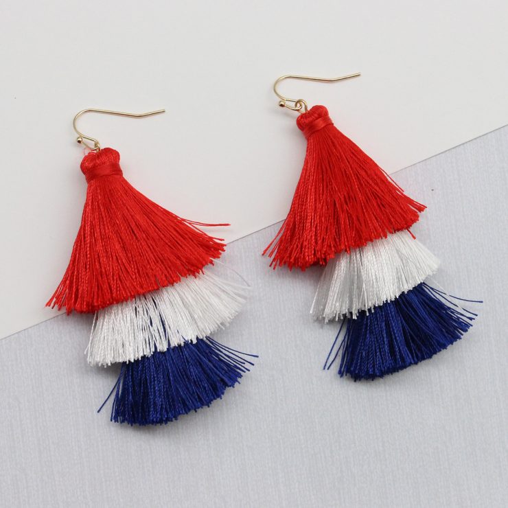 A photo of the Red, White & Boom Tassel Earrings product
