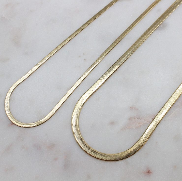 A photo of the Herringbone Chain In Gold product